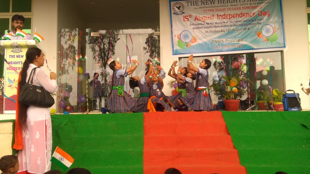 Students performing music at TNHA